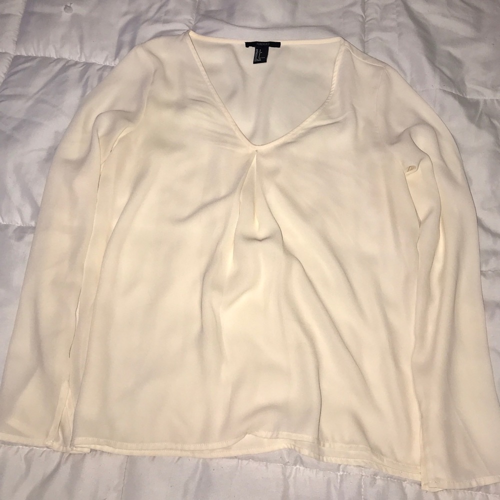 Cream colored flowy top